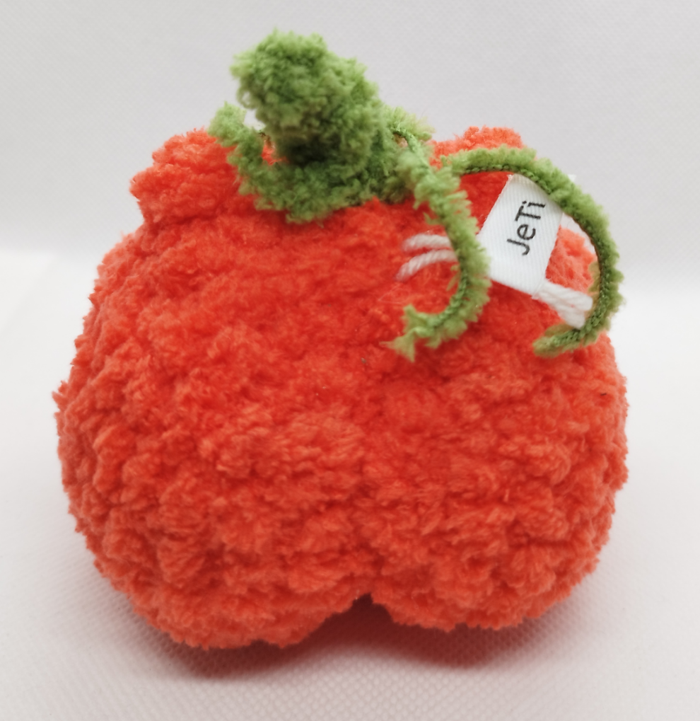 Crocheted pumpkin froggo