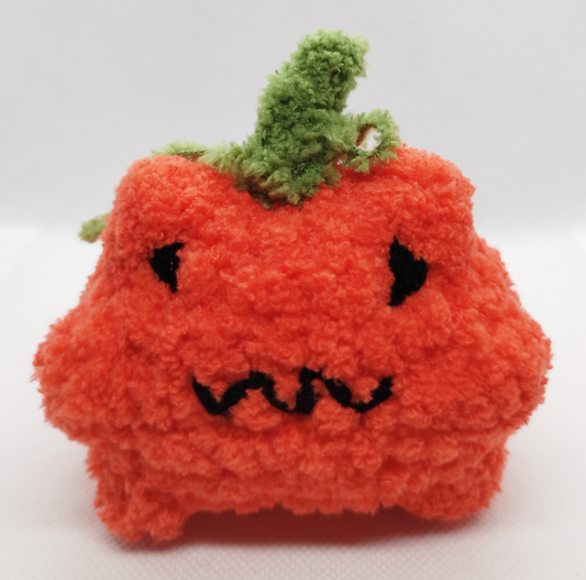 Crocheted pumpkin froggo