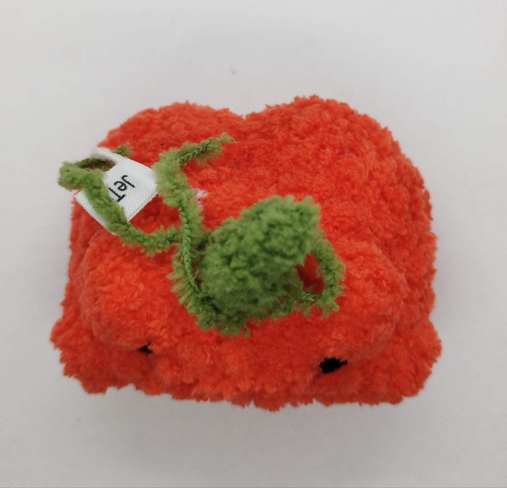 Crocheted pumpkin froggo