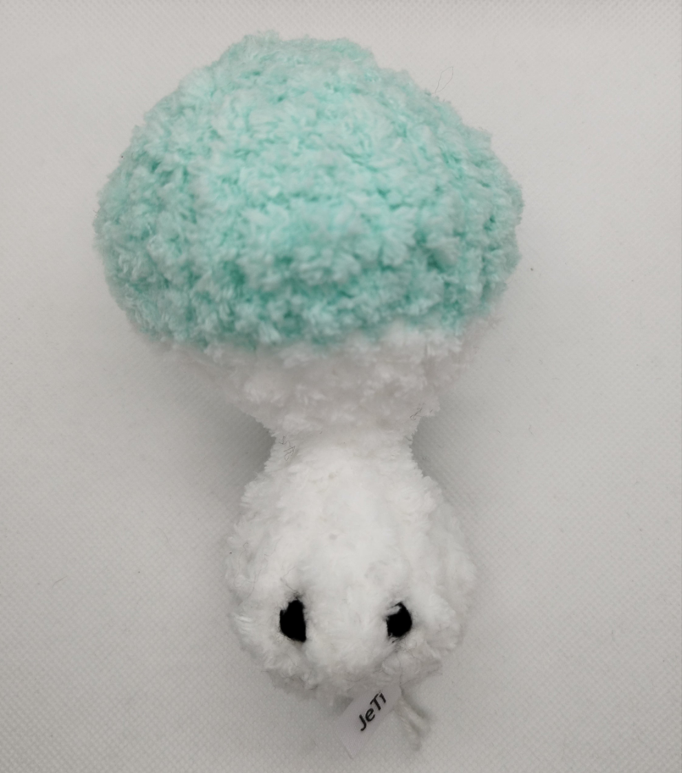 Crocheted popping mushroom Aqua