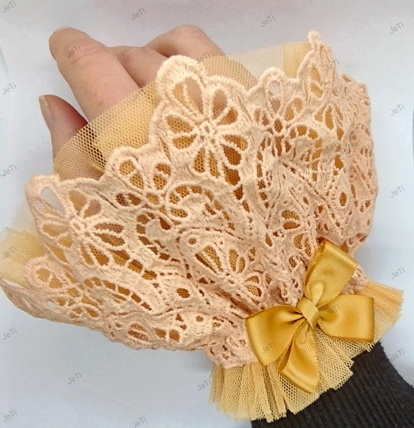 Peach wrist cuffs