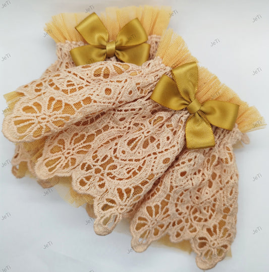 Peach wrist cuffs