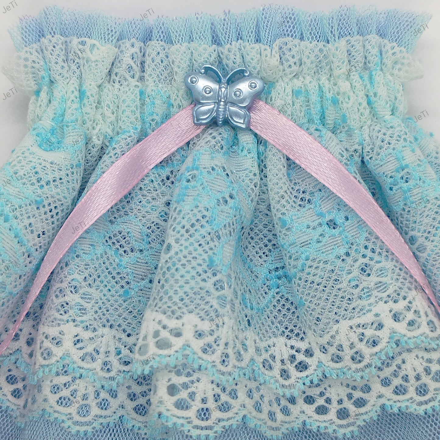 Baby blue lace wrist cuffs