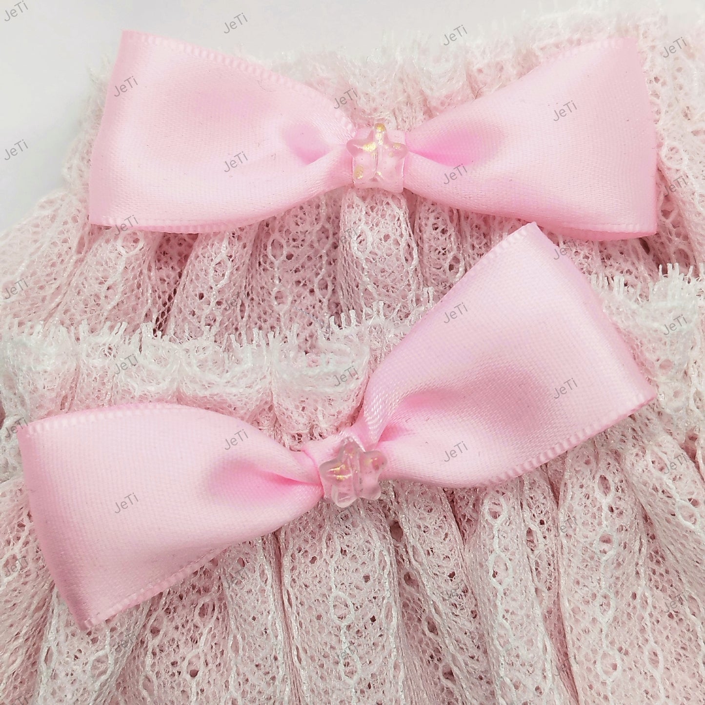 Pink star lace cuffs