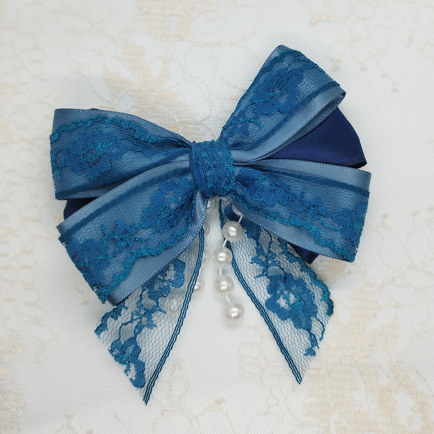 Blue & pearls clip bow