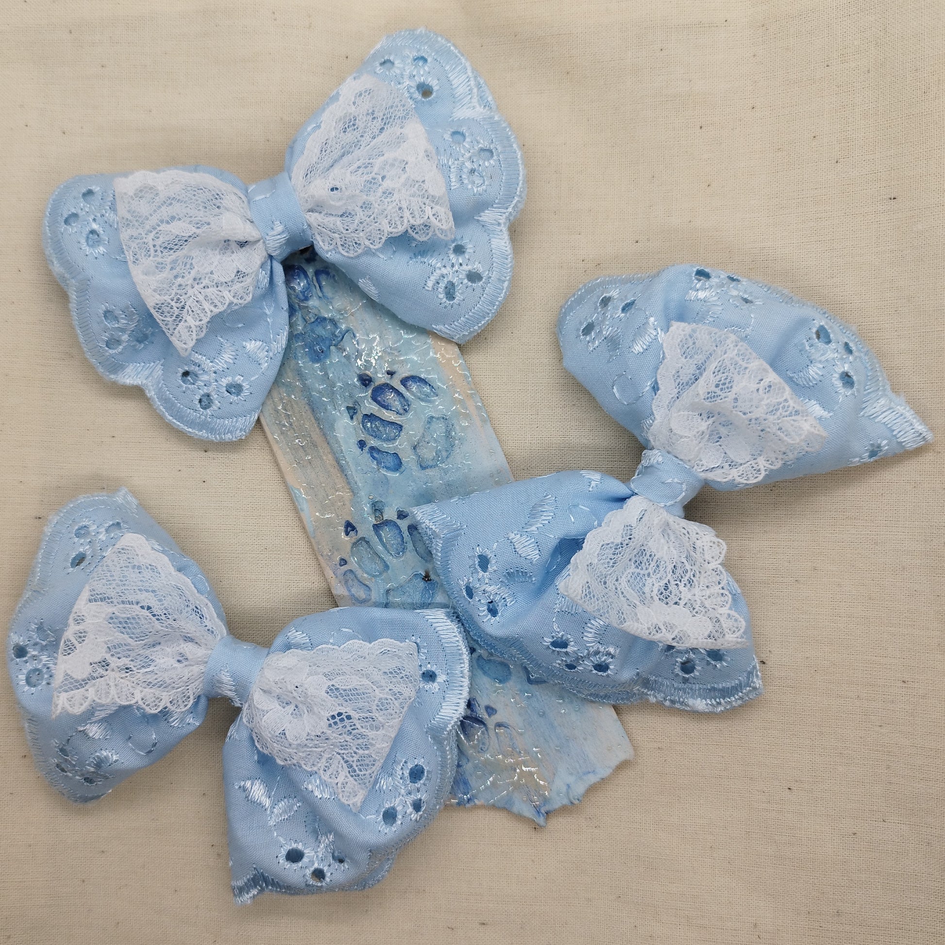 Light blue lace bow hair clip with alligator clip back