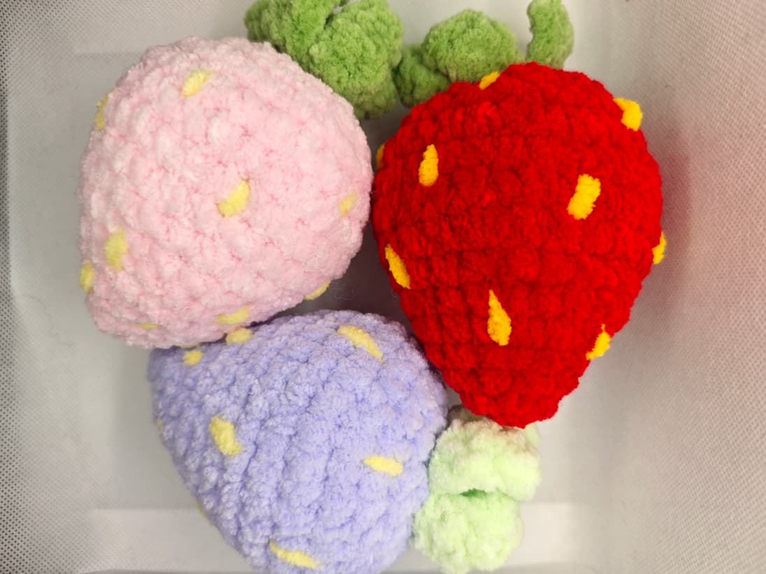 Handmade light pink amigurumi strawberry toy