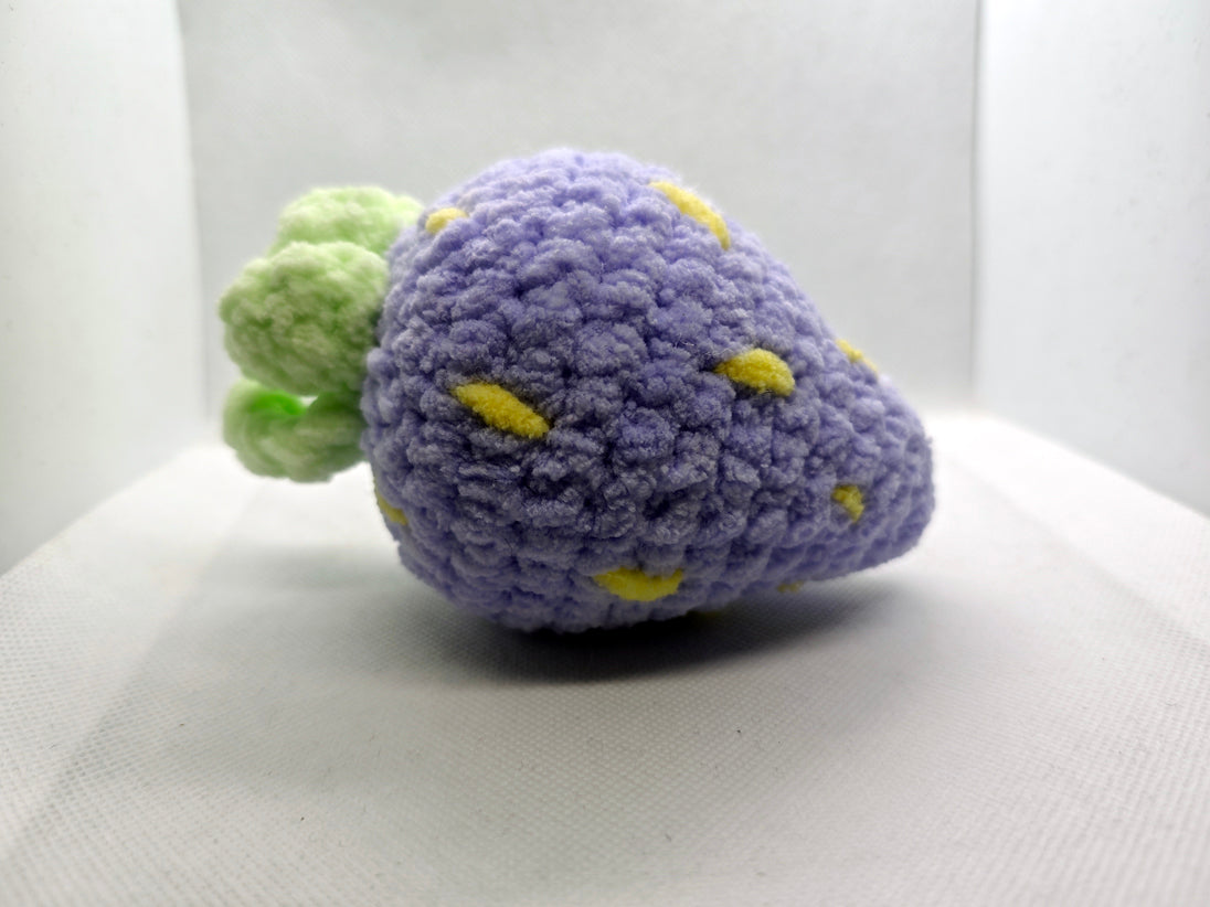 Purple crochet strawberry fidget toy handmade close-up